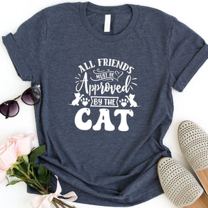 All Friends Must Be Approved By The Cat funny T-Shirt in the colour heather navy  Cat lovers are going crazy for this T-shirt! Makes the perfect gift for a birthday, special occasion, or the upcoming festive season.  Standard Fit T-Shirts, these are comparable to a unisex size. Quality Guaranteed. Super Soft and Comfortable .T-shirt is made of cotton material.