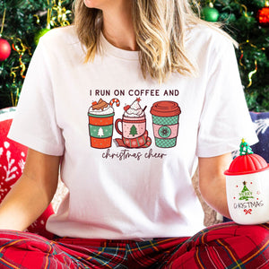 I run on coffee and Christmas cheer t-shirt in the color white, stylish womens fashion t-shirt, Makes the perfect gift for coffee lovers, Beautiful quality material, super soft and made of cotton, custom design and made to order in the usa
