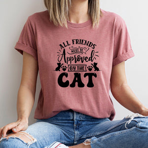 All Friends Must Be Approved By The Cat funny T-Shirt in heather mauve.  Cat lovers are going crazy for this T-shirt! Makes the perfect gift for a birthday, special occasion, or the upcoming festive season.  Standard Fit T-Shirts, these are comparable to a unisex size. Quality Guaranteed. Super Soft and Comfortable . Material - T-shirt is made of cotton.