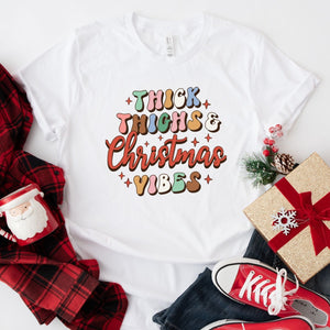 Thick thighs and christmas vibes t-shirt, stylish white xmas t-shirt for women, Makes the perfect gift for those who love Christmas. Beautiful quality and made of cotton, super soft material.